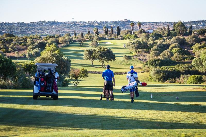 Two Men Playing in the Golf Course in Lagos Portugal